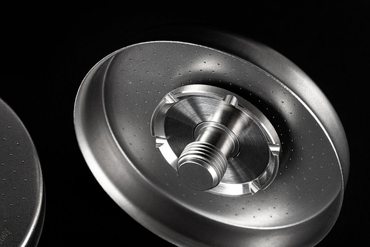 IMS Laser Brew shower screen with integrated laser-welded screw, close-up