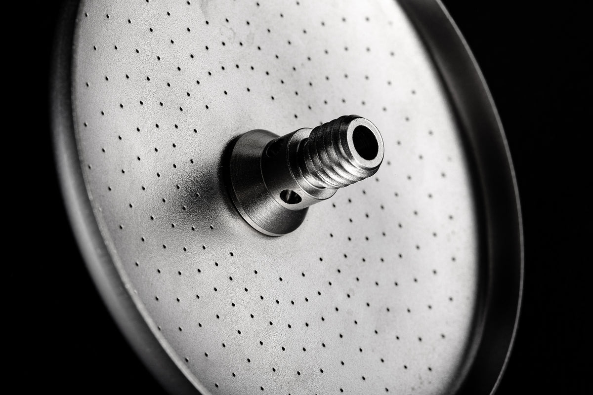 Laser-perforated face of an IMS Laser Brew shower screen