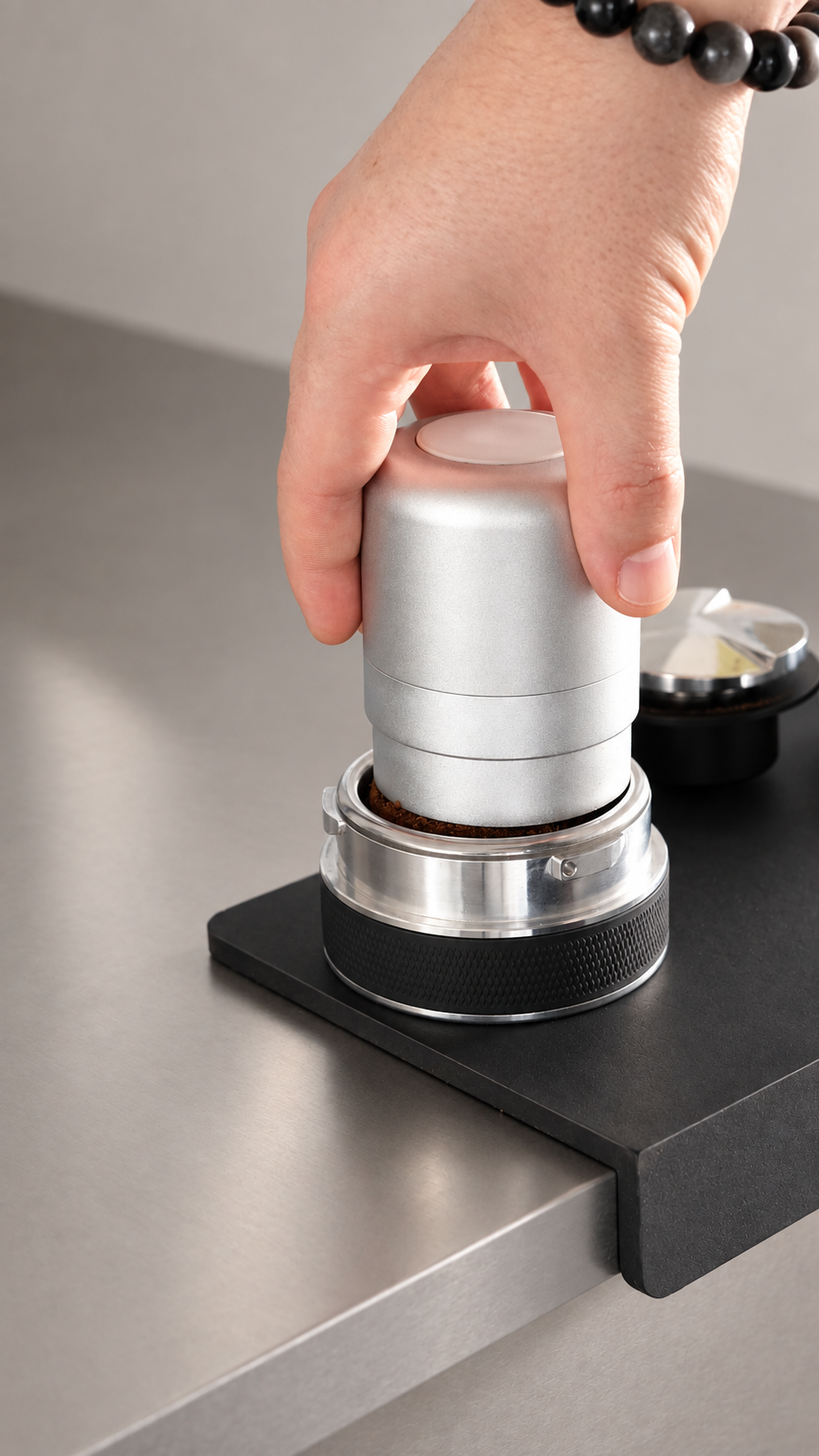 Preparing coffee in the ORBI espresso basket
